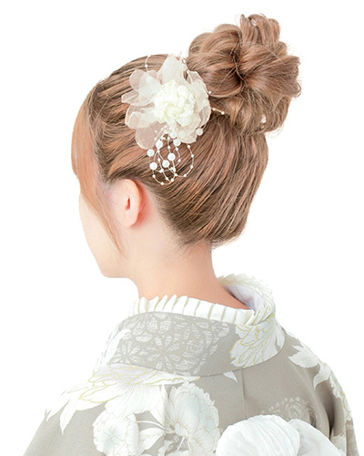 Classic high bun updo to beautifully complete your Kyoto Kimono Experience outfit.